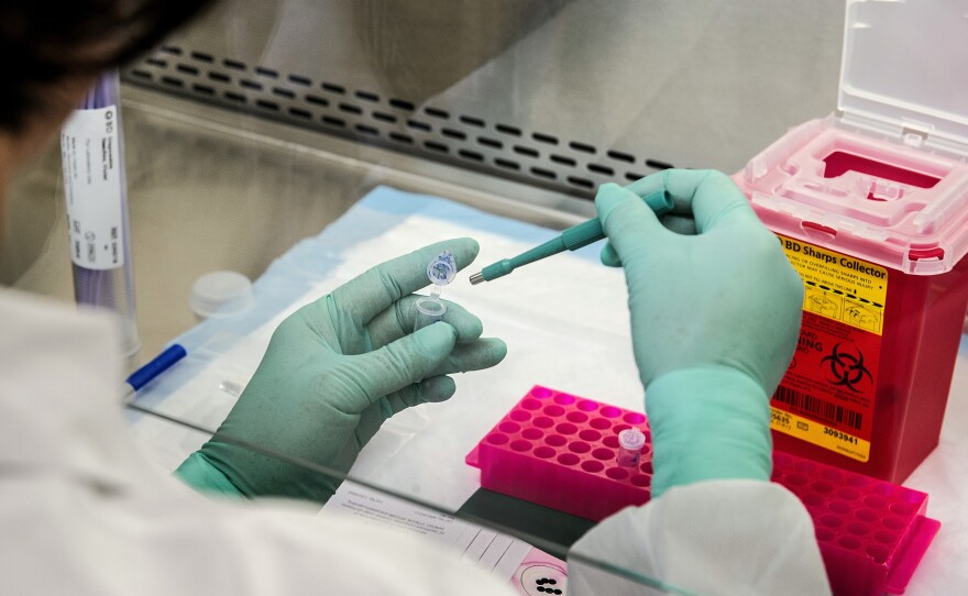 A Centers for Disease Control and Prevention scientist works with polio virus material. The first case of polio in nearly decade was detected in a New York patient Thursday. The individual was unvaccinated and likely contracted the virus from an individual outside of the country.