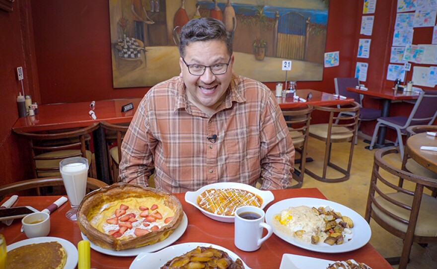 Just look at the excitement in host Jorge Meraz's face as he is about to taste the goodies available at Fat Cat restaurant in Rosarito, Baja Calif.