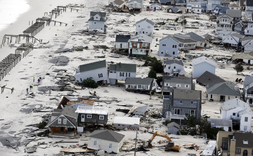 This aerial photo shows destruction in the wake of Superstorm Sandy on Wednesday in Seaside Heights, N.J.