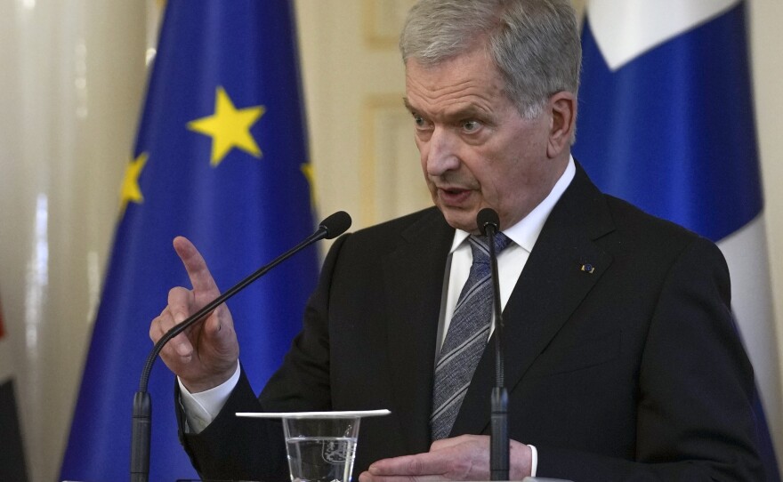 Finland's President Sauli Niinisto makes a point during a joint press conference with British Prime Minister Boris Johnson, at the Presidential Palace in Helsinki, Finland, Wednesday, May 11, 2022.