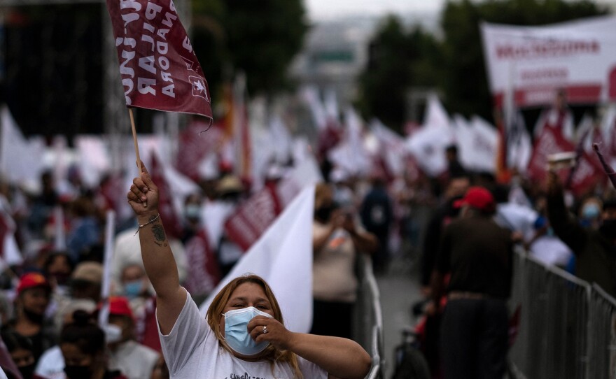 Supporters of the Morena party's candidate for governor of Baja California, Marina del Pilar Ávila, attend the closing campaign rally in Tijuana, Baja California, Mexico, on Wednesday.