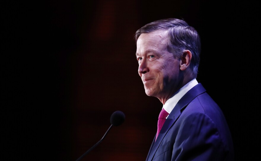 Former Colorado Gov. John Hickenlooper speaks during a forum in Miami in June.
