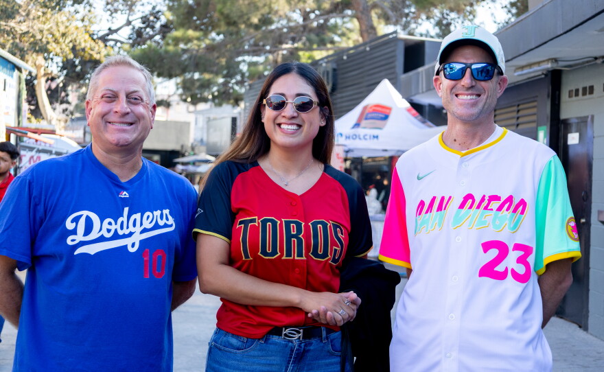 Three friends who came from San Diego to the Toros game to see Justin Turner, at the Toros Mobil Park, in Tijuana, Mexico, July 31, 2026.