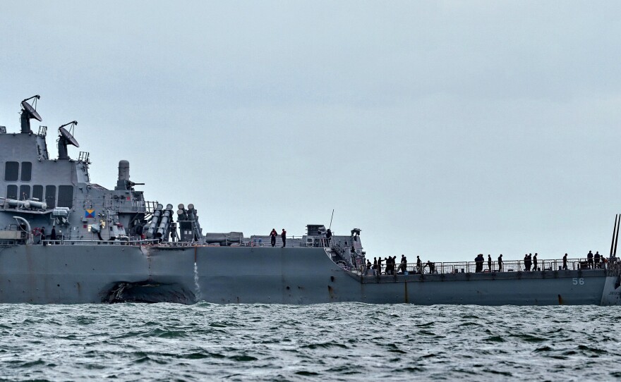 The USS John S. McCain was left with a hole on its port side after a collision with oil tanker earlier this week, one of three such incidents this summer.