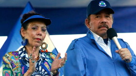 President Daniel Ortega and his wife, Vice President Rosario Murillo, lead a rally in Managua, Nicaragua, Sept. 5, 2018.