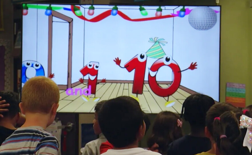 First grade students at Del Rio STEM Academy watch an educational math video in this undated photo.