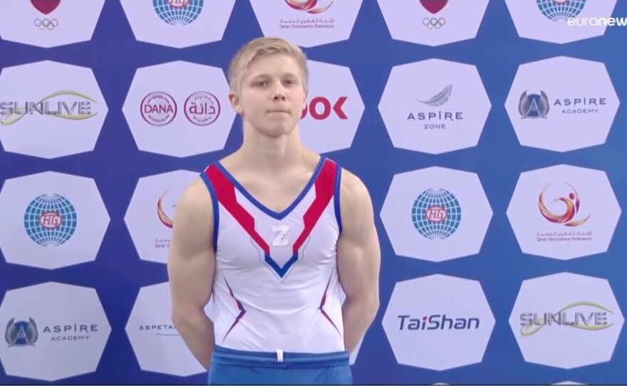 Ivan Kuliak wears a Z symbol at a gymnastics World Cup event in Doha, Qatar on Saturday.