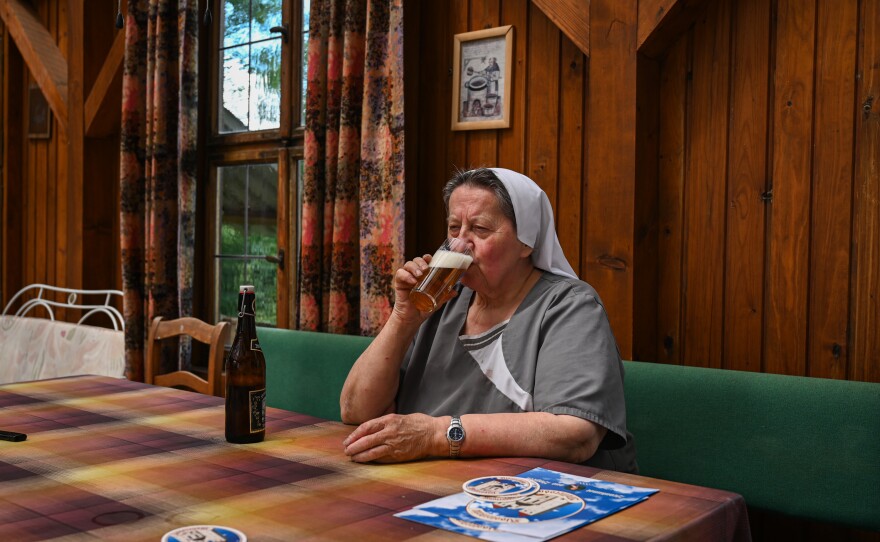 Sister Doris drinks her after work beer.