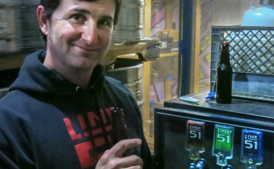 P.T. Lovern conducts deep hop research at the company's office at a warehouse in Oakland, Calif.