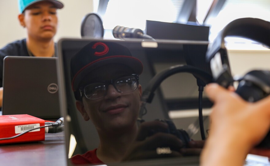 Students, cousins and podcast finalists Julian Fausto (right) and Eric Guadarrama in the Morton East Library where they recorded their podcast.
