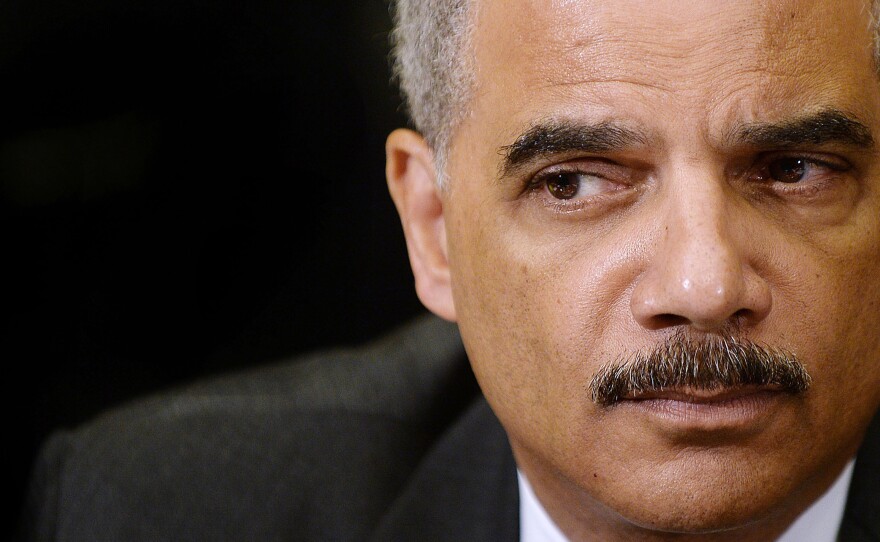 U.S. Attorney General Eric Holder attends a meeting with the My Brother's Keeper Task Force in May. He announced today that he is stepping down from his job.