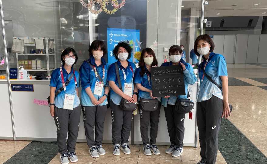 These volunteers working in the media center wanted to do something to show journalists about the culture of Japan.