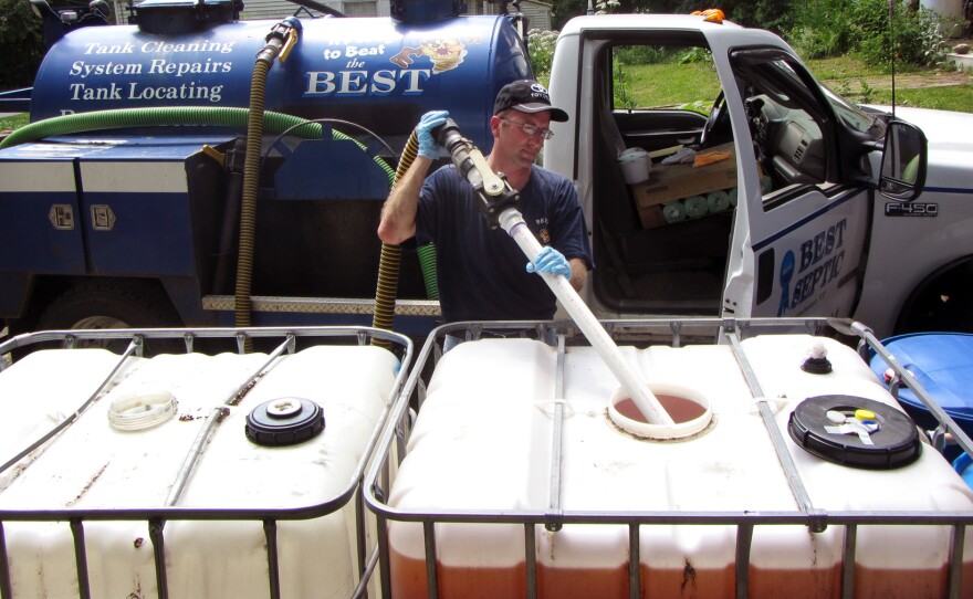 Seth True of Best Septic pumping urine from the 275 gallon tank. A family of three can fill a tank this size in eight months.