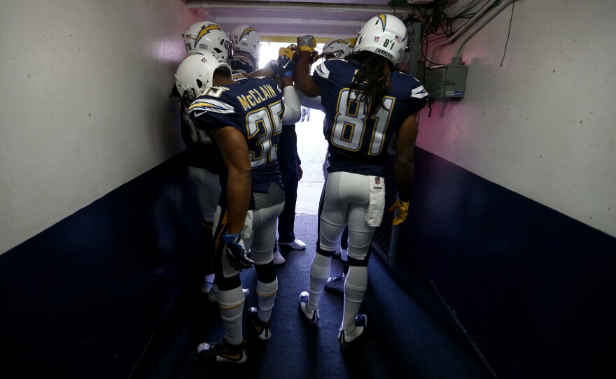 The San Diego Chargers prepare to take the field before a Jan. 1 game against the Kansas City Chiefs in Qualcomm Stadium, in what was the final home game for the Chargers in San Diego.