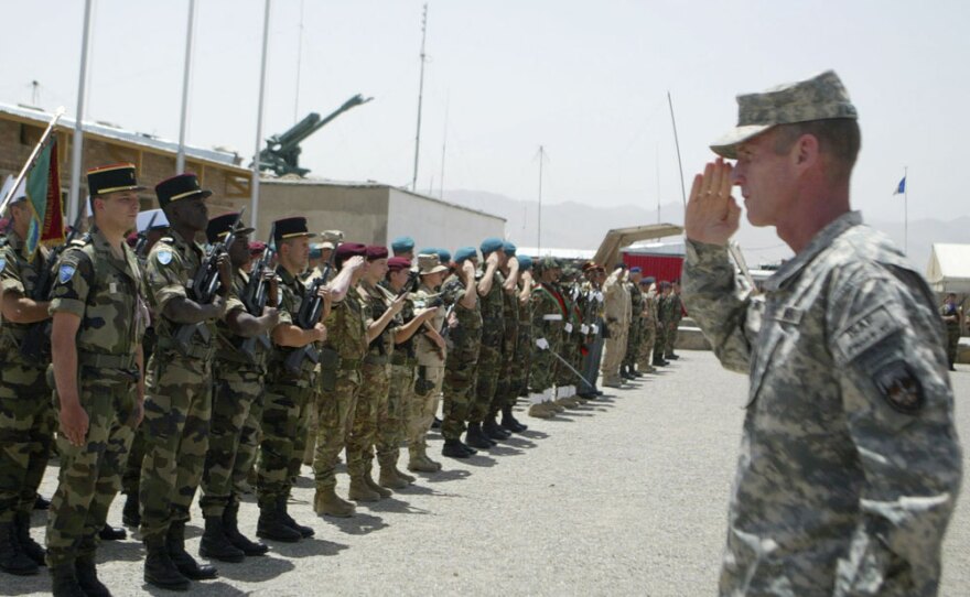 U.S. Gen. Stanley McChrystal, commander of the NATO-led International Security Assistance Force in Afghanistan, salutes ISAF soldiers during a changing of command ceremony in Kabul, Afghanistan, July 10, 2009.