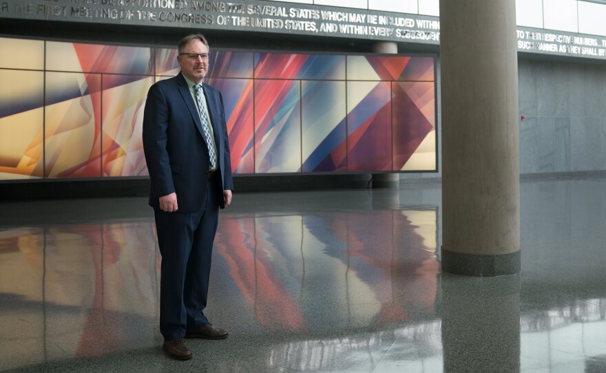 Acting U.S. Census Bureau Director Ron Jarmin stands in the lobby of the agency's headquarters in Suitland, Md. The bureau is facing six lawsuits from more than two dozen states and cities, plus other groups, that want a new question about U.S. citizenship removed from the 2020 census.