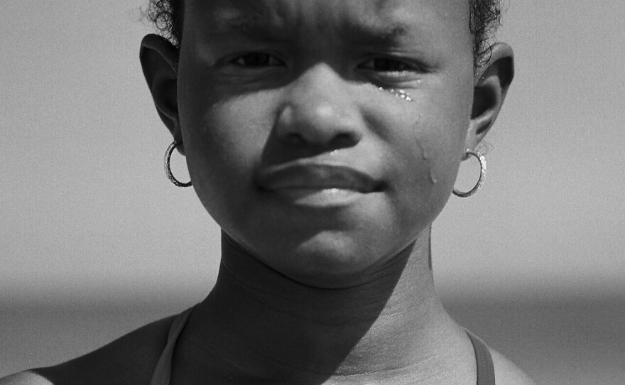 Stevens' niece Destiny, 8, sheds a tear along the shore of a North Carolina beach. A normal response to her allergies, it also felt symbolic of the history along these Southern waters and for the gaze to lie along the shoreline, which Stevens said "asked me to reckon with the history of enslavement ... Rather than directing attention outward, her gaze returned it to the act of witnessing."