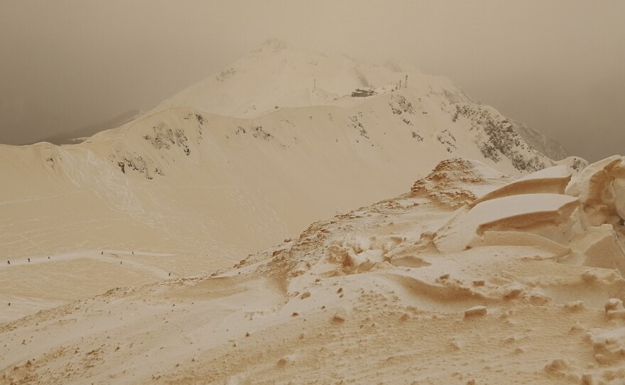 Orange snow in the mountains at the Rosa Khutor ski resort outside Sochi, Russia, on Friday.