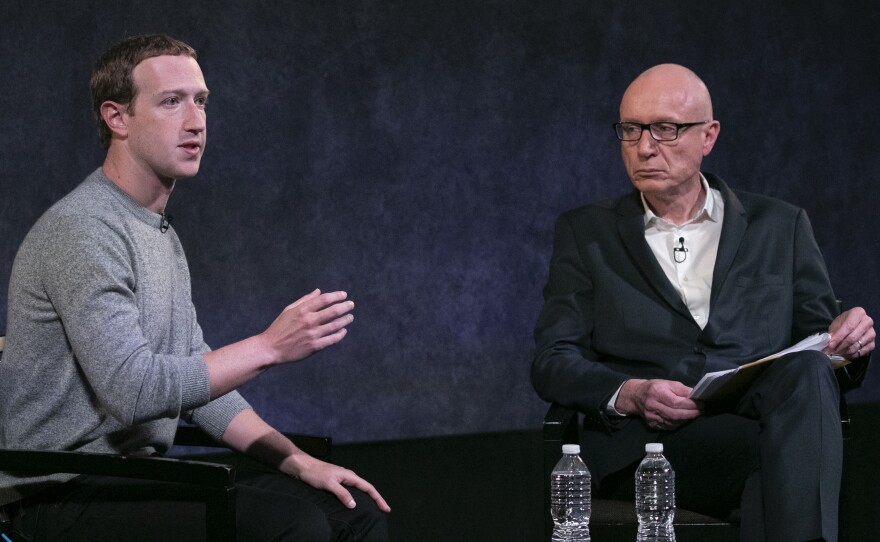 Facebook CEO Mark Zuckerberg, left, has agreed to submit to a newly formed oversight board, which will examine whether to remove posts from the website.