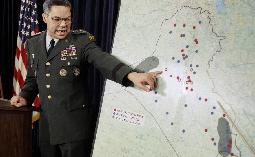 Chairman of the Joint Chiefs of Staff Colin Powell points to Iraqi airbases at a Pentagon briefing on Jan. 23, 1991. Powell became a household name during the first Gulf War.
