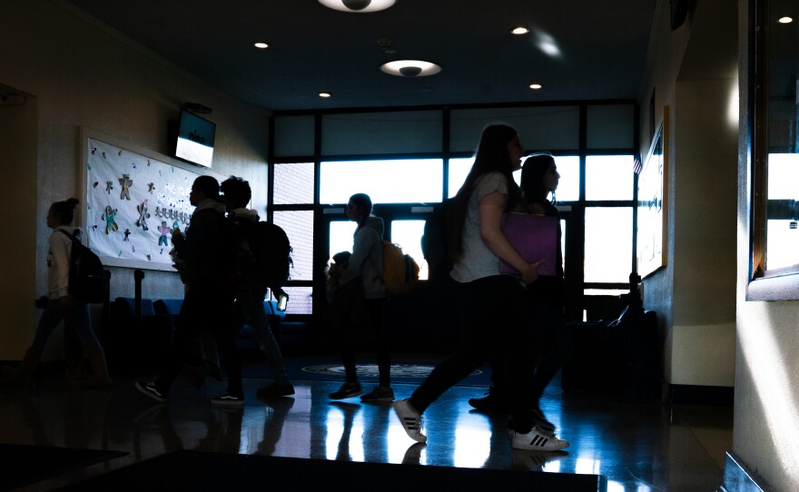 Students walk through the hallways of Manville High School between class periods. Fewer homes have meant fewer tax dollars to fund education, and the public school system has found itself battling large budget shortfalls.