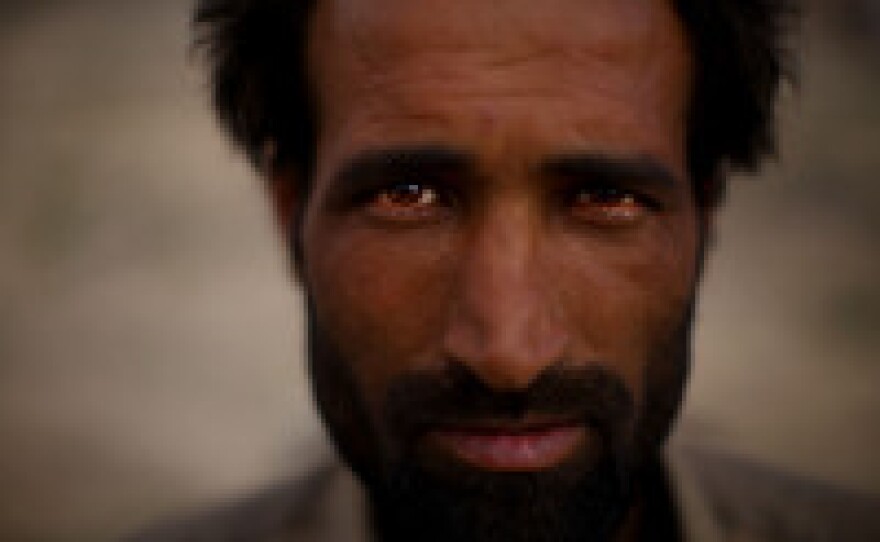 The slum of Kamar Kulagh, which sits on the outskirts of Herat, Afghanistan near the border with Iran, is filled with drug addicts using crystal meth and heroin. NPR's David Gilkey took portraits of residents.