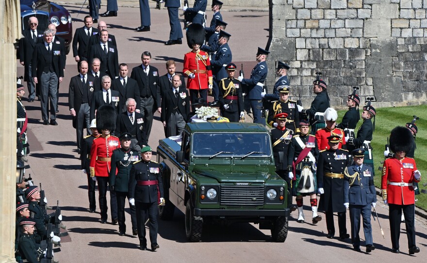 Members of the royal family follow Prince Philip's coffin during the ceremonial procession during his funeral at Windsor Castle on Saturday in Windsor, England.