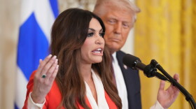 FILE - Kimberly Guilfoyle speaks as President Donald Trump listens at a reception celebrating Greek Independence Day in the East Room of the White House, March 24, 2025, in Washington.