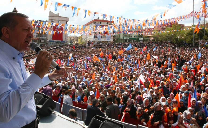Turkish Prime Minister Recep Tayyip Erdogan addresses supporters during an election rally for his Justice and Development Party, or AK Party. Critics are concerned that the party could win a two-thirds majority in Parliament, which would allow them to rewrite the constitution without input from secular forces or the public.