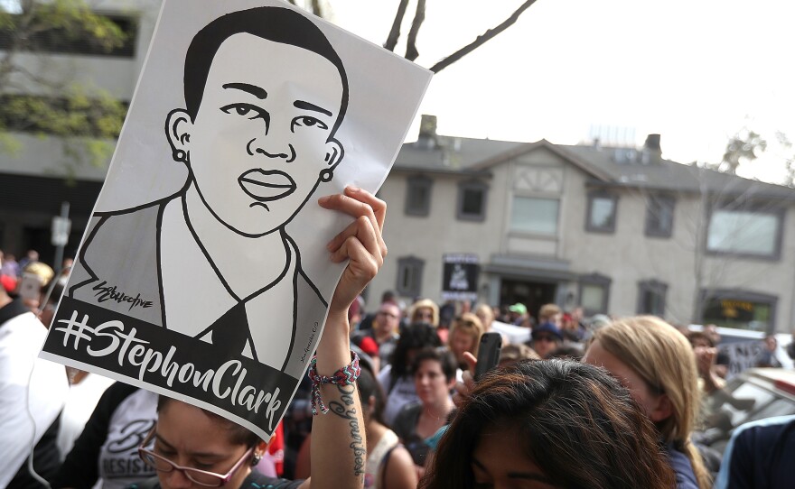 Black Lives Matter protesters stage a demonstration in front of the offices of Sacramento County District Attorney Anne Marie Schubert on April 4 in Sacramento, Calif. Protesters rallied to demand justice for Stephon Clark, an unarmed black man who was shot and killed by Sacramento police on March 18.