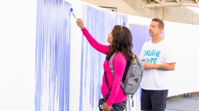 Jeppe Hein's "Breathe With Me" is shown in progress at the University of San Diego on Oct. 24, 2024. Hein is pictured in the background.