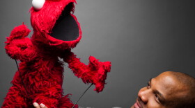 Elmo and Kevin Clash in the documentary "Being Elmo."