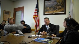Acting Warden Greg Lewis fields reporters' questions about Pelican Bay State Prison's policies of indefinitely confining validated gang members in isolation units.