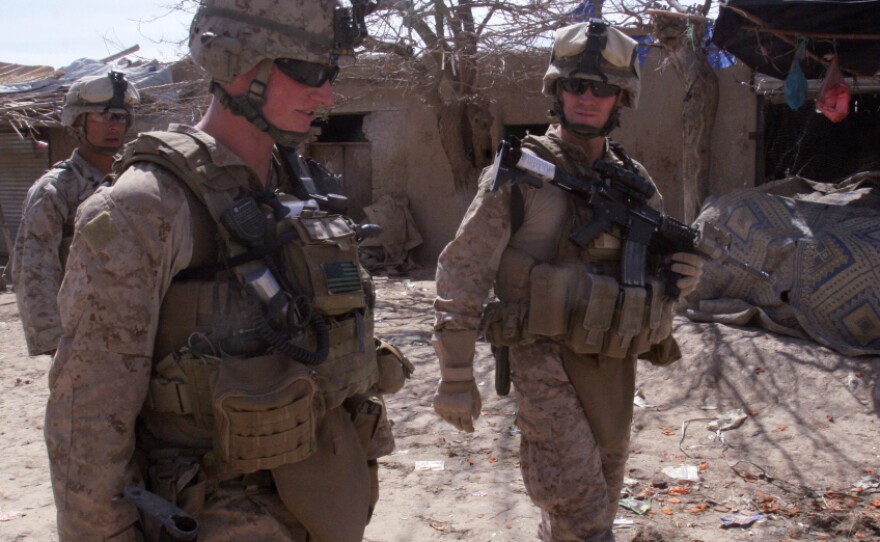 <p>Lt. Col. Jason Morris (right), the commanding officer for 3rd Battalion, 5th Marine Regiment, discusses the Marines' progress during Operation Golden Shillelagh in Malmand, Afghanistan, on March 12, with 1st Lt. Charles Broun.</p>