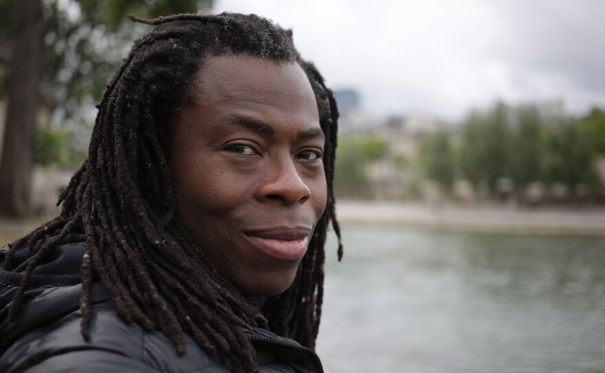 Ade Adepitan at the River Seine in Paris.
