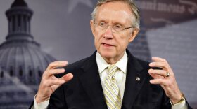 Senate Majority Leader Harry Reid says the Senate's merged health care bill will include a government-sponsored program in the insurance market. But it remains unclear whether Reid has locked in the 60 votes needed to guarantee passage of a final bill with a public option.