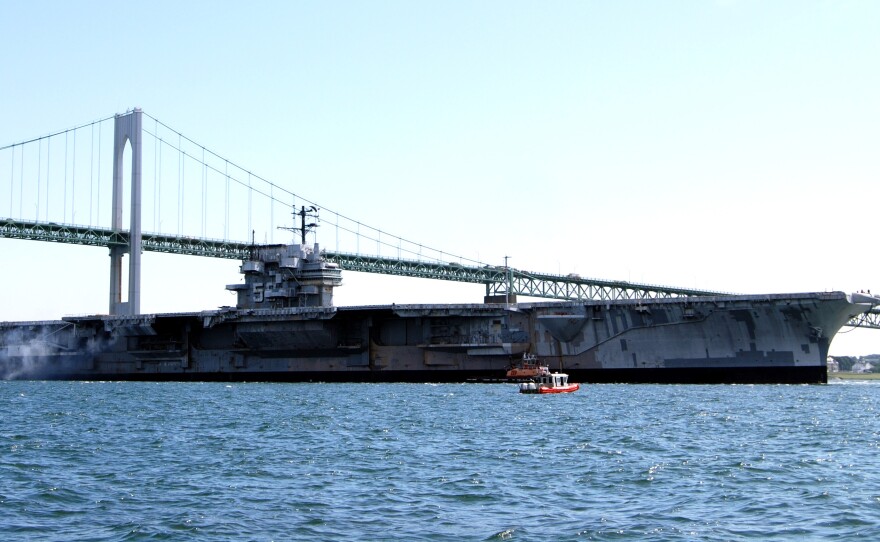 The decommissioned aircraft carrier USS Forrestal departs Newport, R.I., for a three-day cruise to Philadelphia in 2010.