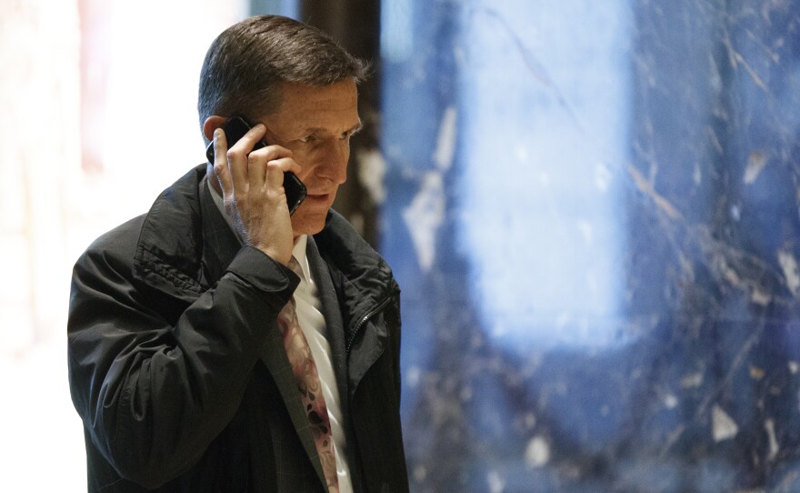 National Security Adviser nominee Michael Flynn walks in the lobby of Trump Tower in New York.