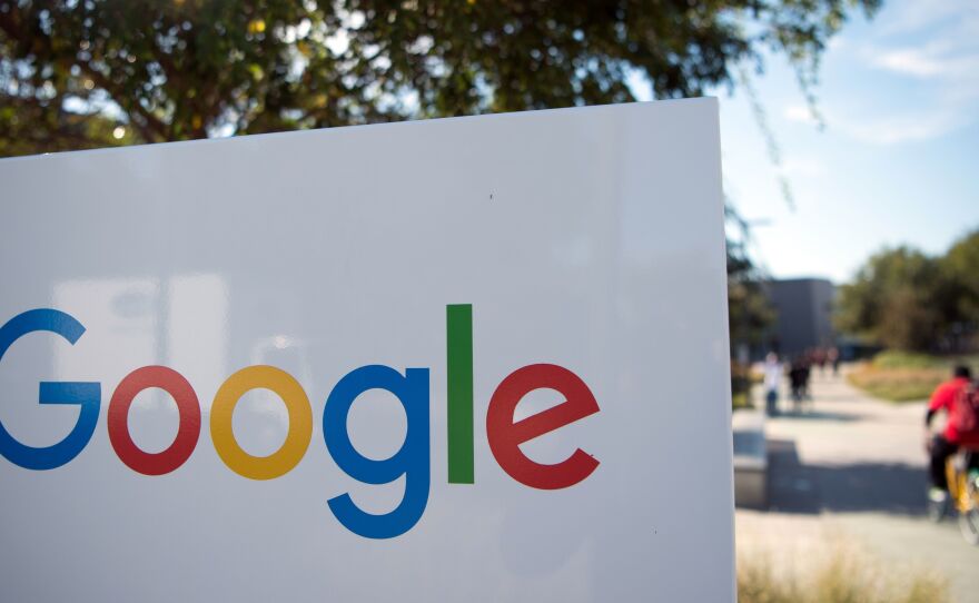 A Google sign and logo at the Googleplex in Menlo Park, Calif. This week, Google project manager spoke to Reuters about a problem discovered in the firm's email service.