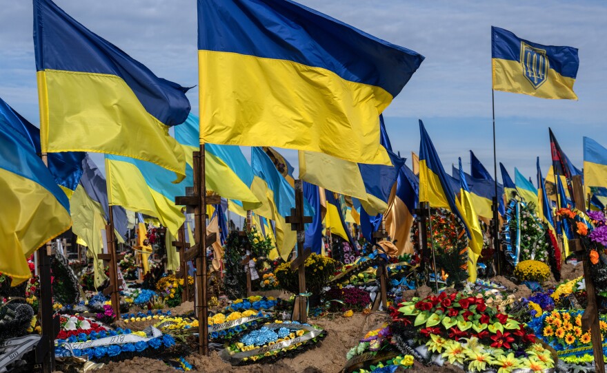 Ukrainian flags fly in Kharkiv, Ukraine, on Oct. 19, marking the graves of soldiers killed in action following the Russian invasion earlier this year.