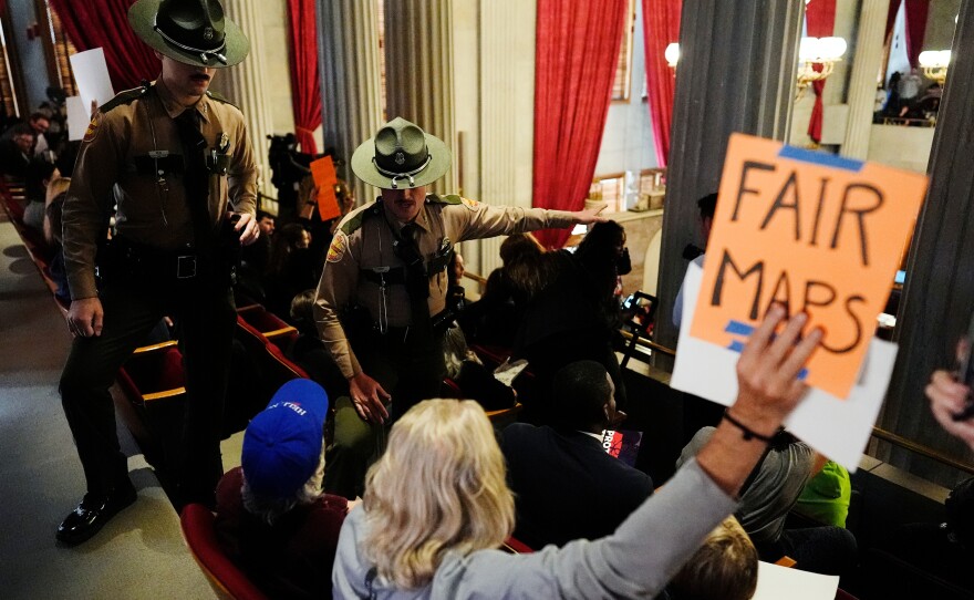 State troopers remove people from the Tennessee House gallery on Thursday during a special session of the state legislature to redraw congressional voting maps.