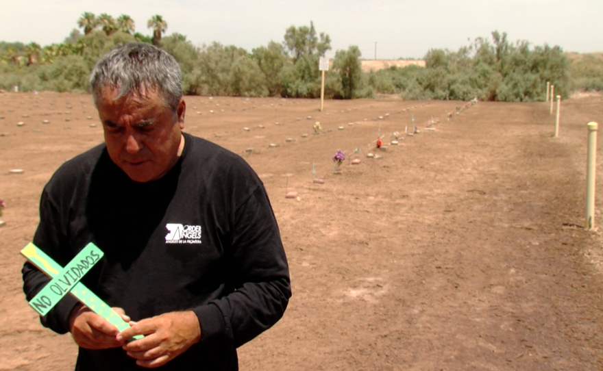 Enrique Morones, founder of Border Angels, stands in Terrace Park Cemetery, June 27, 2016.