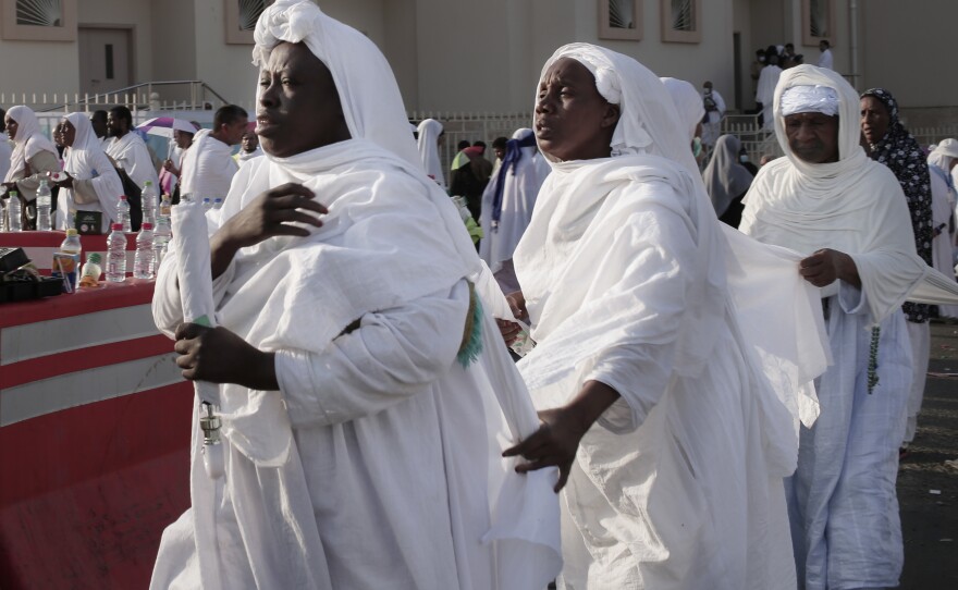 Muslim pilgrims make their way to Mount Arafat during the annual hajj pilgrimage.