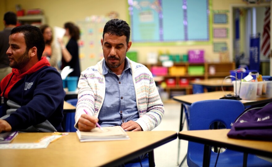 Omar attends an English as a second language class offered by the Water for Ishmael, a Christian organization in Toledo.