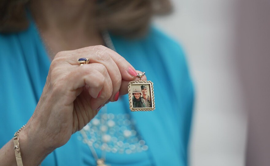 Carol Graham holds a picture