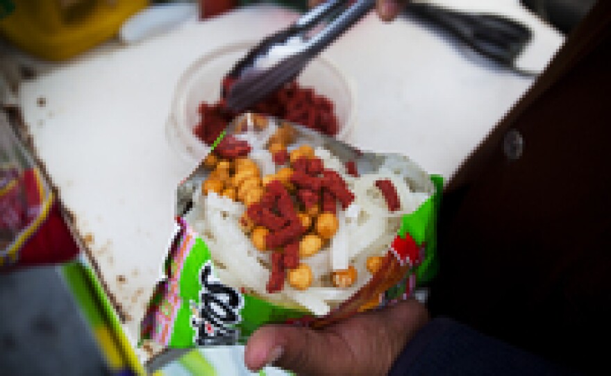 Sprinkle with tamarind candy.