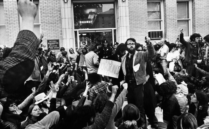 Protesters against the United States' participation in the Vietnam War are seen outside the national headquarters of the Selective Service System, which oversees the draft, on May 3, 1971, in Washington, D.C.