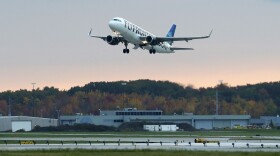 The Frontier Airlines plane that Amber Vinson flew from Cleveland to Dallas on Oct. 13, flies out of Cleveland Hopkins International Airport, Oct. 15, 2014, in Cleveland. Vinson was the second nurse to be diagnosed with Ebola at the Texas Health Presbyterian Hospital in Dallas. 