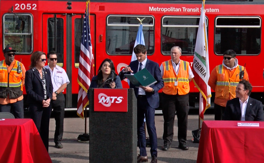Grecia Figueroa, former MTS employee, speaks at a news conference attended by San Diego County Supervisor Nathan Fletcher, Dec. 2, 2022.
