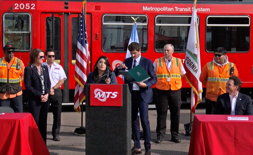 Grecia Figueroa, former MTS employee, speaks at a news conference attended by San Diego County Supervisor Nathan Fletcher, Dec. 2, 2022. 